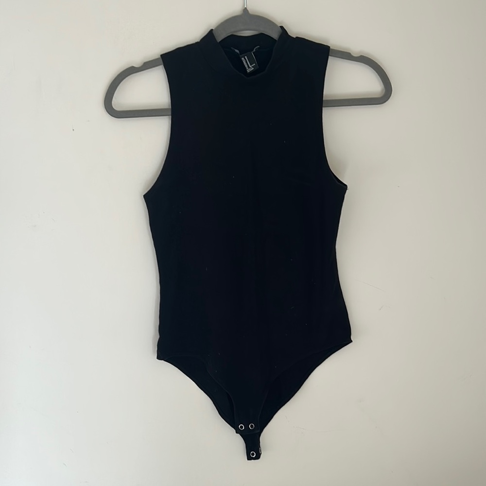 Mock neck sleeveless body suit